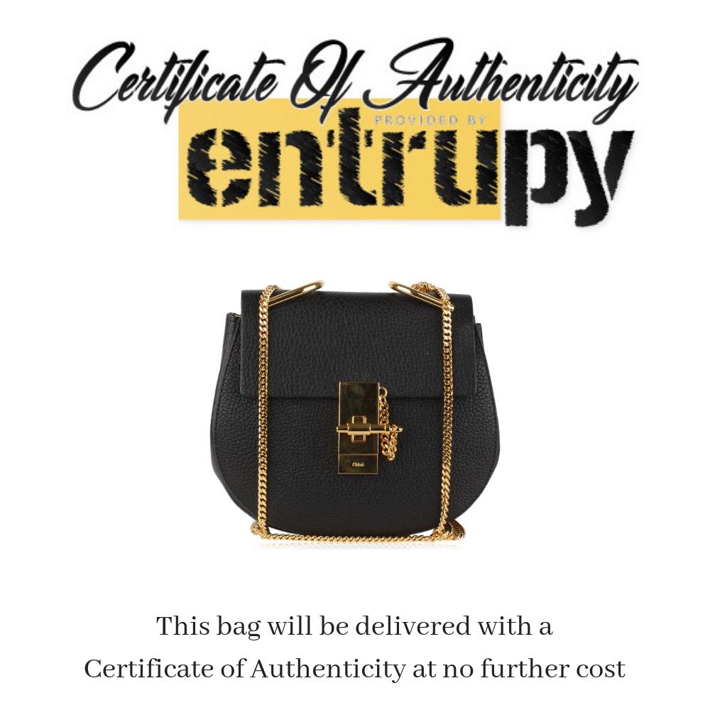 We offer Certificate of Authenticity provided by Entrupy for this item at no further cost.

Chloé's 'Drew' Crossbody bag. Crafted of black grained leather  A beautiful day-to-evening bag. It feautures 'CHLOE - Made in Italy' logo stamped on the