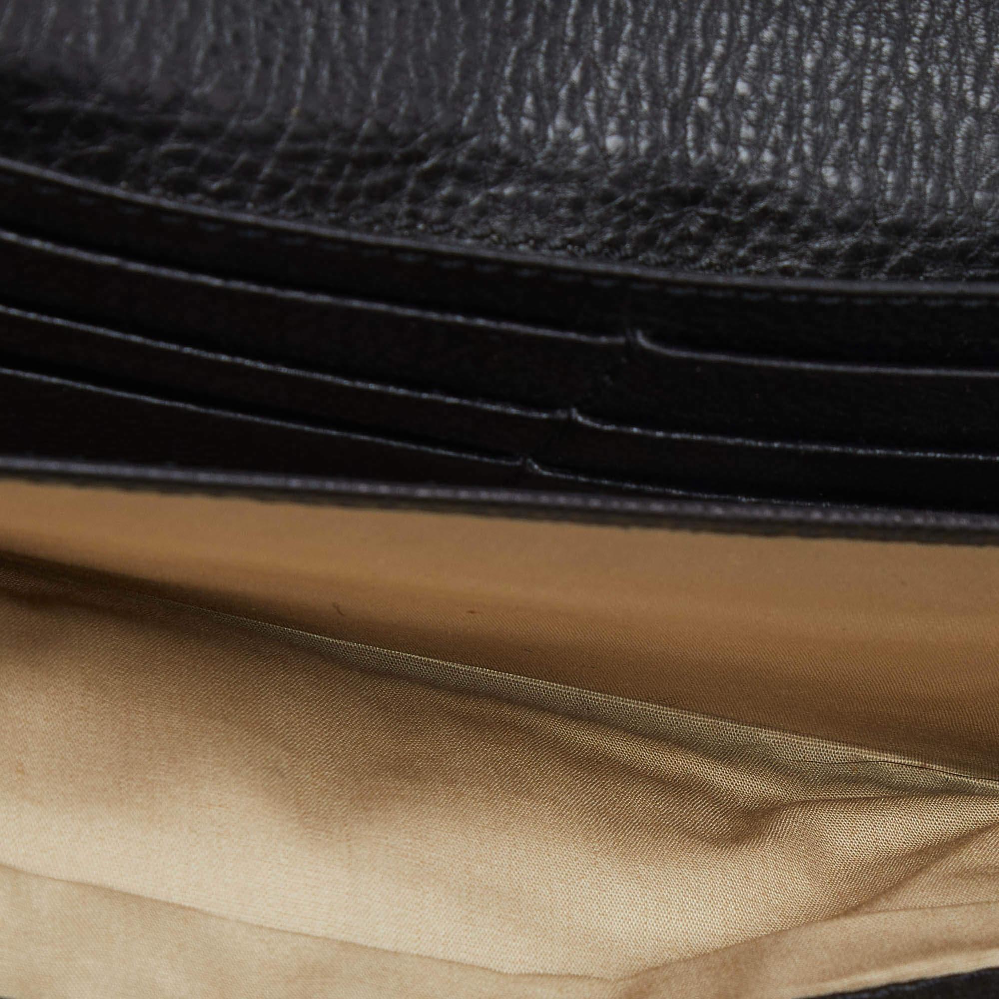 Sleek and minimal  Chloeâ€™s Elsie wallet is perfect for everyday use. Made from leather  it features a front flap with a gold tone turnlock closure  opening up to a leather lined interior. It is finished with an external zipper pocket for