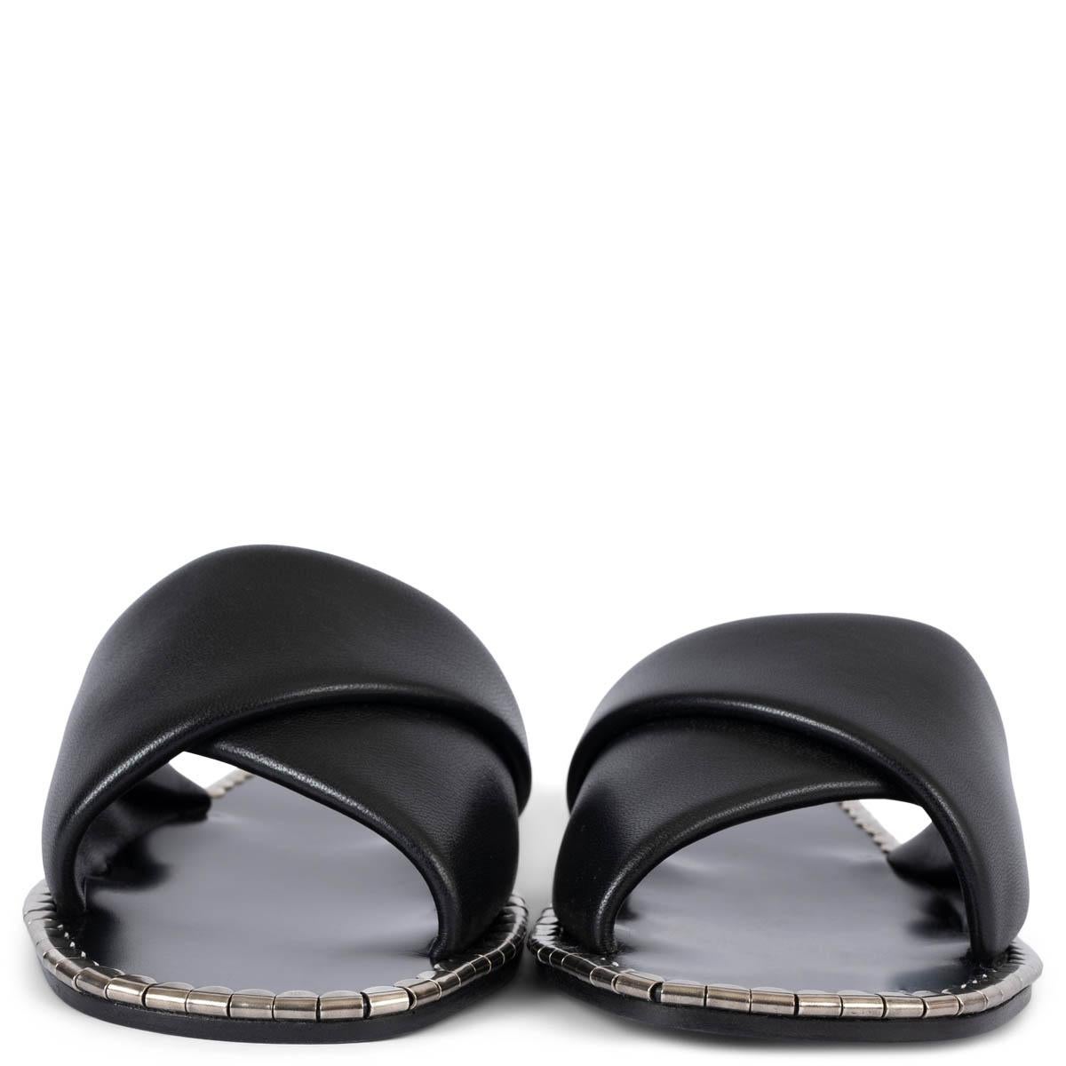 100% authentic Chloé Idol flat slide sandals with a black padded leather upper with silver metal scallops adding a touch of jewelry. Brand new.Come with dust bags. 

Measurements
Imprinted Size	37
Shoe Size	37
Inside Sole	24cm (9.4in)
Width	7.5cm