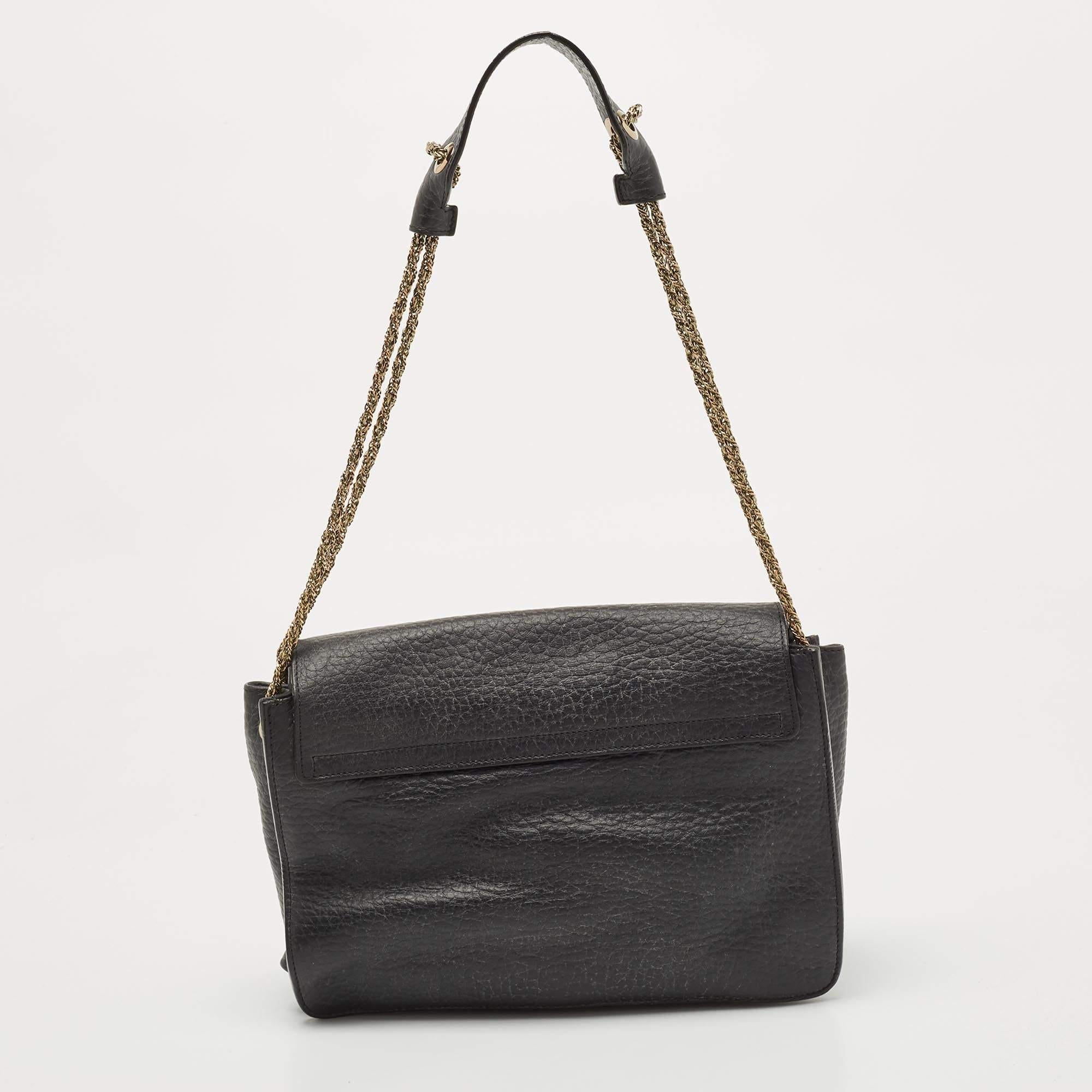 For a look that is complete with style, taste, and a touch of luxe, this designer bag is the perfect addition. Flaunt this beauty on your shoulder and revel in the taste of luxury it leaves you with.

Includes Original Dustbag, Authenticity Card,