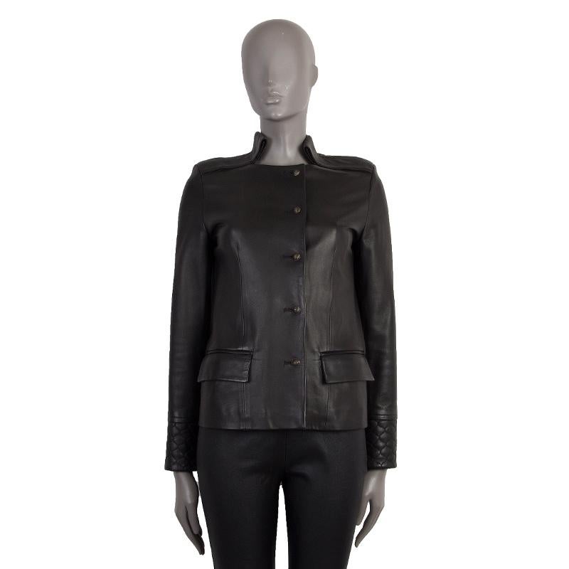 authentic Chloe jacket in black lambskin leather with quilted details on the sleeves and the back. Two front slap pockets. Opens with button front. Lined in black fabric. Has been worn and is in excellent condition.

Measurements
Tag