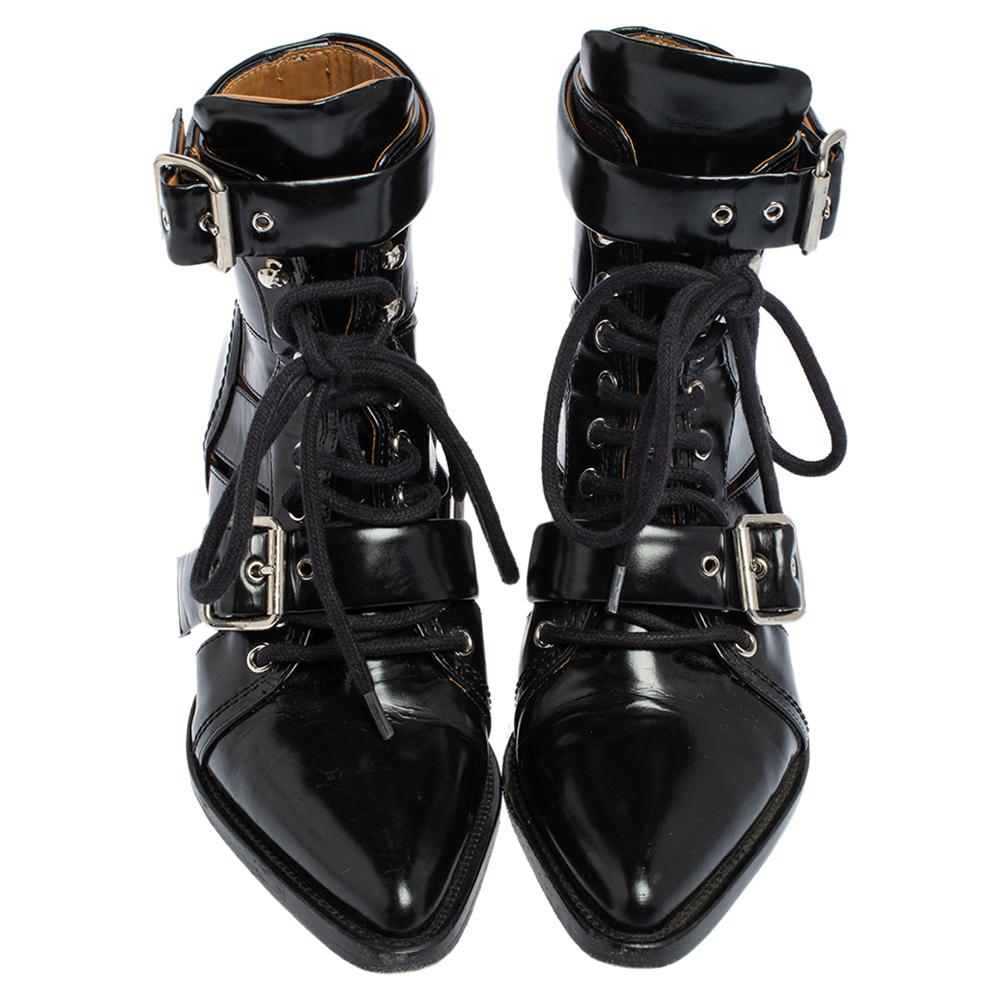 Black boots are a must in every fashionista's wardrobe. Chloé introduces a gorgeous pair of ankle boots, crafted in leather establishing a high-end diva look. The pair features low block heels with front lace and buckled strap closure and pointed