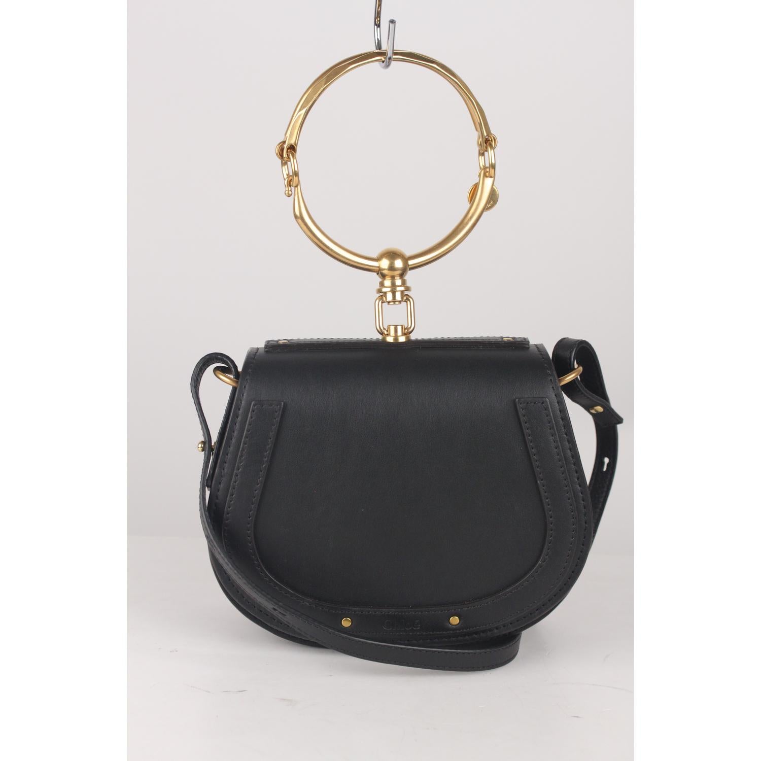 We offer Certificate of Authenticity provided by Entrupy for this item at no further cost.

Chloé's 'Nile' bracelet bag. Crafted of black leather and suede. A beautiful day-to-evening bag from the Chloe 2017 summer collection. It feautures CHLOE'