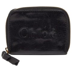 Cartera compacta con cremallera de piel negra Chloe