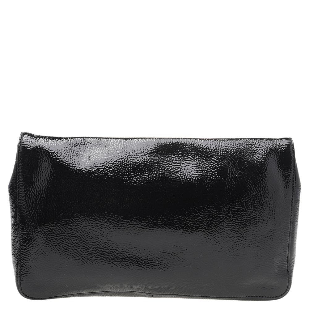 Every curve and detail on this Chloe Elsie is grand which adds to the worth of this clutch. It has been crafted from patent leather and styled with a flap. The bag is secured by a turn-lock revealing a smart interior lined with leather and equipped