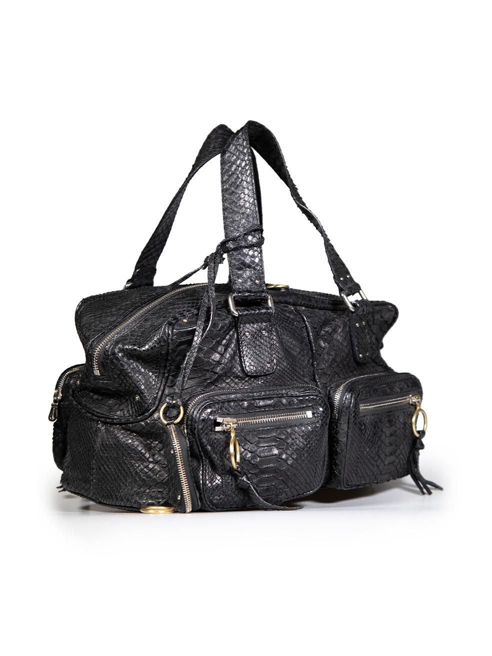 CONDITION is Very good. Minimal wear to bag is evident. Minimal wear to the exterior with curling of the snakeskin seen throughout. Some mild tarnishing is also seen on the hardware detailing and the leather zipper tassels have split on this used