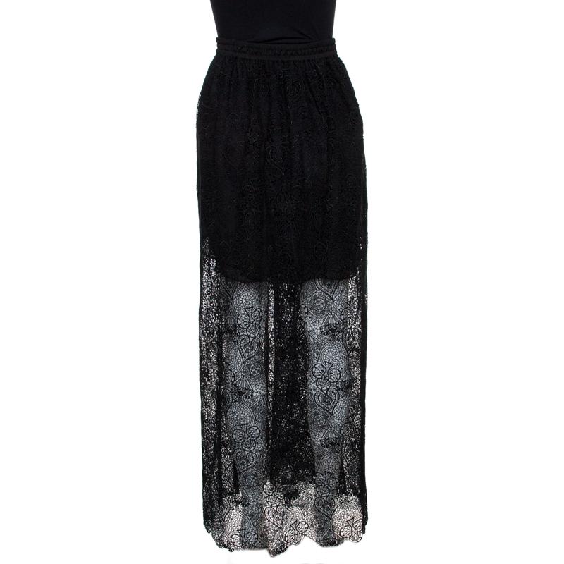 This stunning maxi skirt from Chloe will elevate your outfits instantly. Crafted from cotton, it comes in a classic shade of black. The skirt has a flowy silhouette, a lace overlay with sheer quality and a good fit. It is great for evenings and will