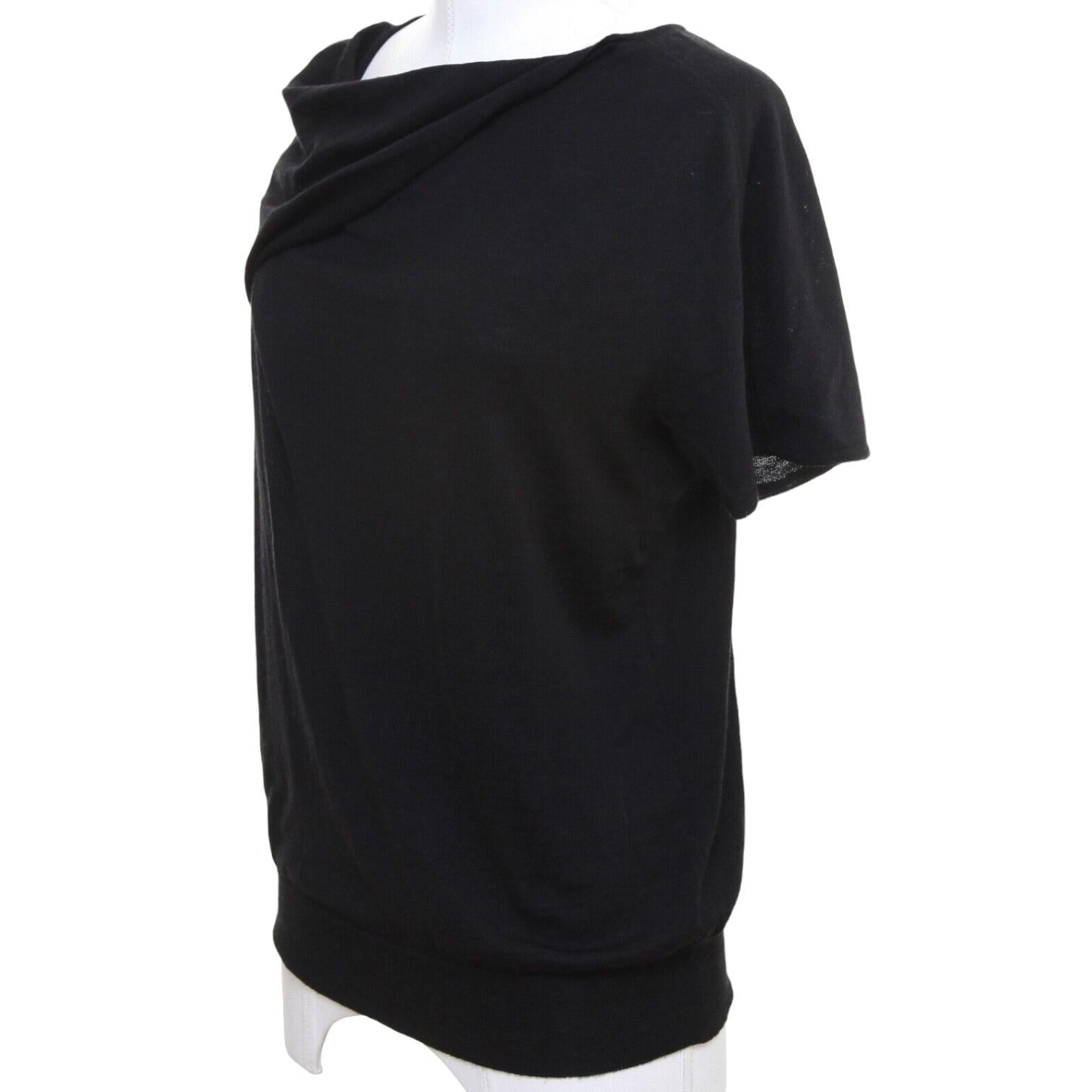 JERSEY NEGRO DE MANGA CORTA CHLOE AUTÉNTICO GARANTIZADO



Diseño:
  - Bonito escote drapeado.
  - Manga corta.
  - Canalé en el dobladillo.
  - Deslícese.

Talla: XS

Material: 100% Lana

Medidas (aproximadas en horizontal, el material cede):
  -