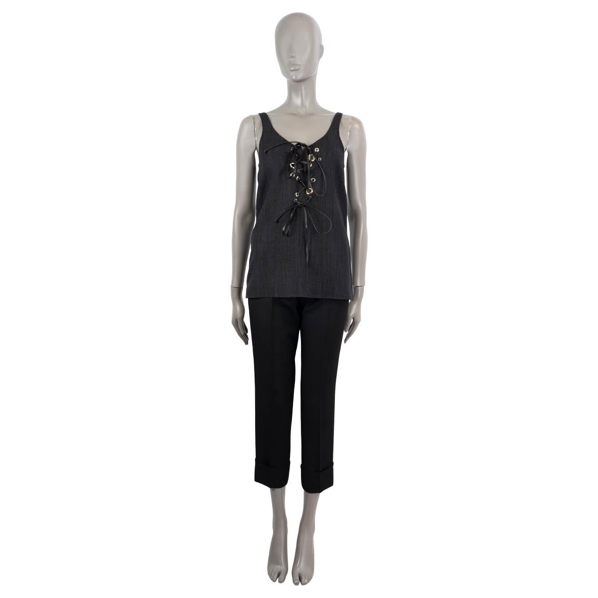 100% authentic Chloé lace-up tank top in black silk (62%), wool(25%) linen (11%) and polyamide (2%). Features scattered light gold-tone eyelets along the front with slim black leather ties. Brand new with tags. 

2022 Spring/Summer

Measurements
Tag