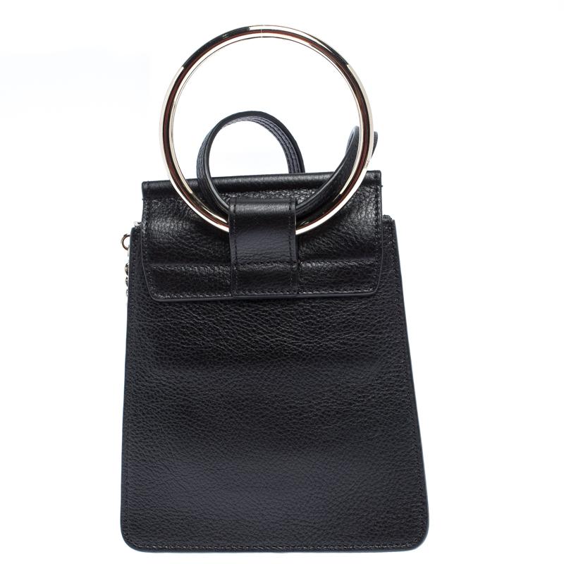 You are going to love owning this Faye bag from Chloe as it is well-made and brimming with luxury. The bag has been crafted from leather as well as velvet and designed with star appliques and chain detail on the flap. The bag is complete with a ring