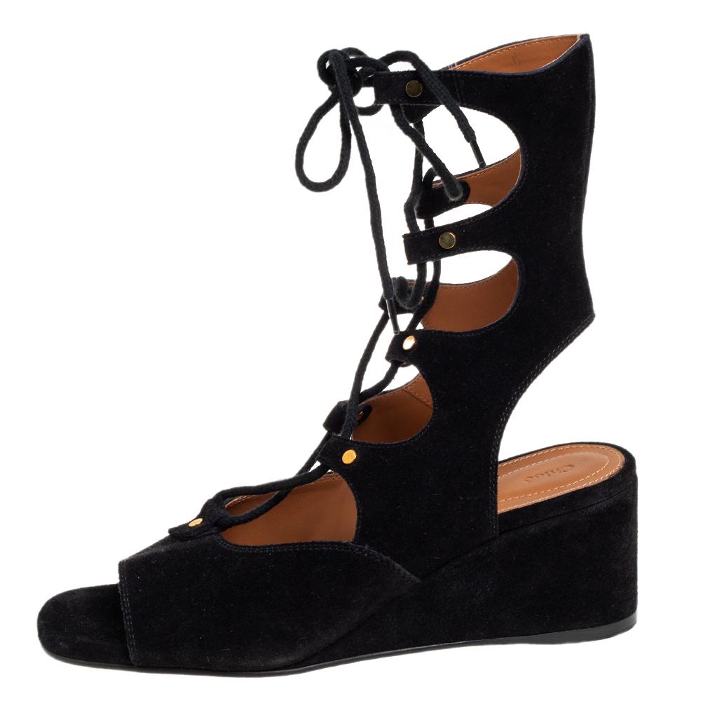 These Foster sandals will instantly make you feel in style. In black color, this pair is crafted from suede. Chloe has added lace-up details that highlight the whole design. Keep it light and casual with these cute wedge sandals.

