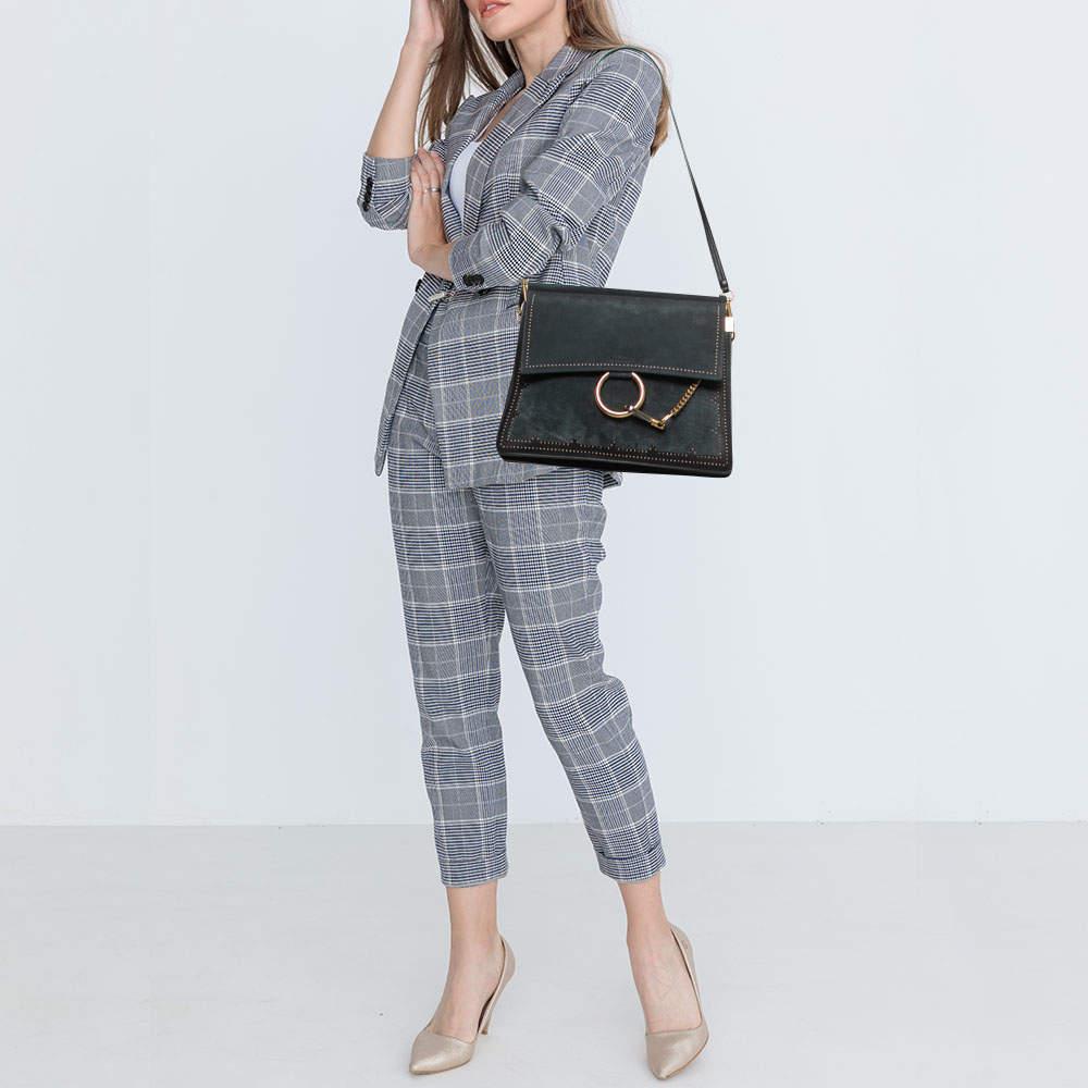 For a look that is complete with style, taste, and a touch of luxe, this designer bag is the perfect addition. Flaunt this beauty on your shoulder and revel in the taste of luxury it leaves you with.

Includes
Original Dustbag, Authenticity Card