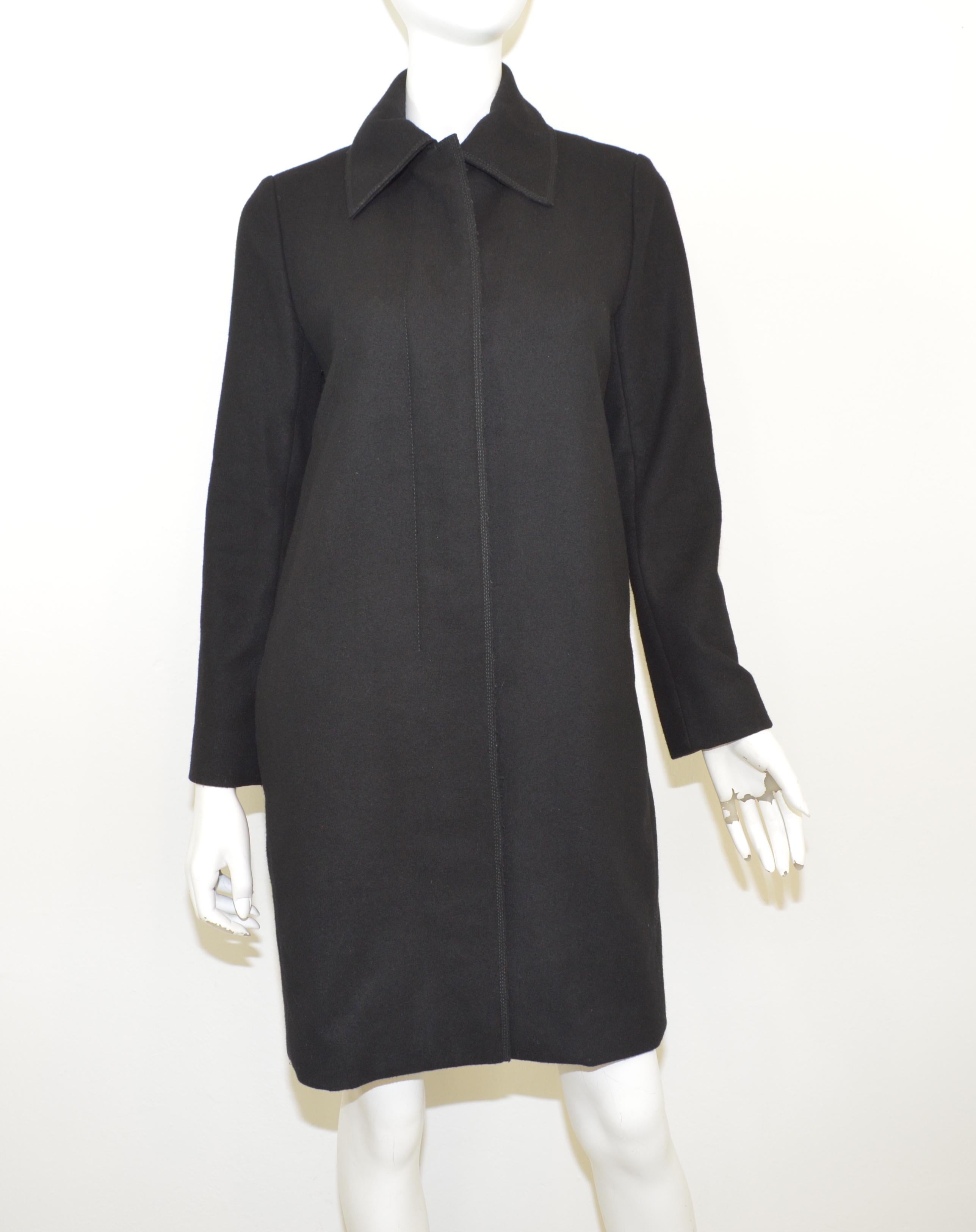 Chloe coat features concealed button closures along the front with pockets at the hips, composed with 100% wool, size 38, made in Slovakia. Excellent condition.

Measurements:
Bust 36''
Sleeves 23''
Hips 42''
Length 38''
Shoulder to shoulder 15.5''
