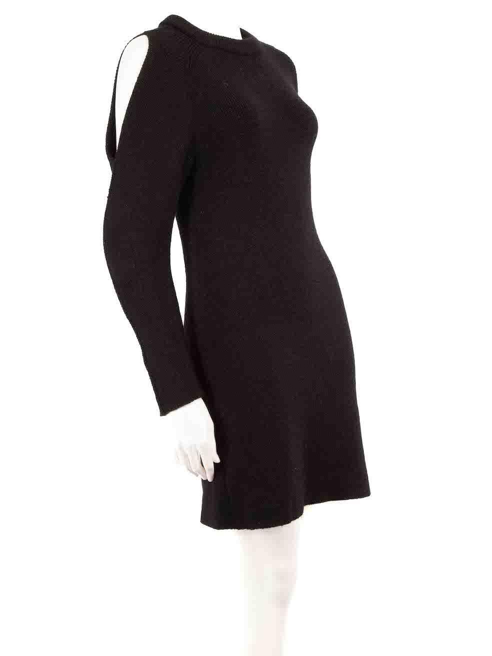 CONDITION is Very good. Hardly any visible wear to dress is evident on this used Chloé designer resale item.
 
 Details
 Black
 Wool
 Mini dress
 Round neckline
 Cold shoulder detail
 Knitted and stretchy
 
 Made in Italy
 Composition
 47% Wool, 47%