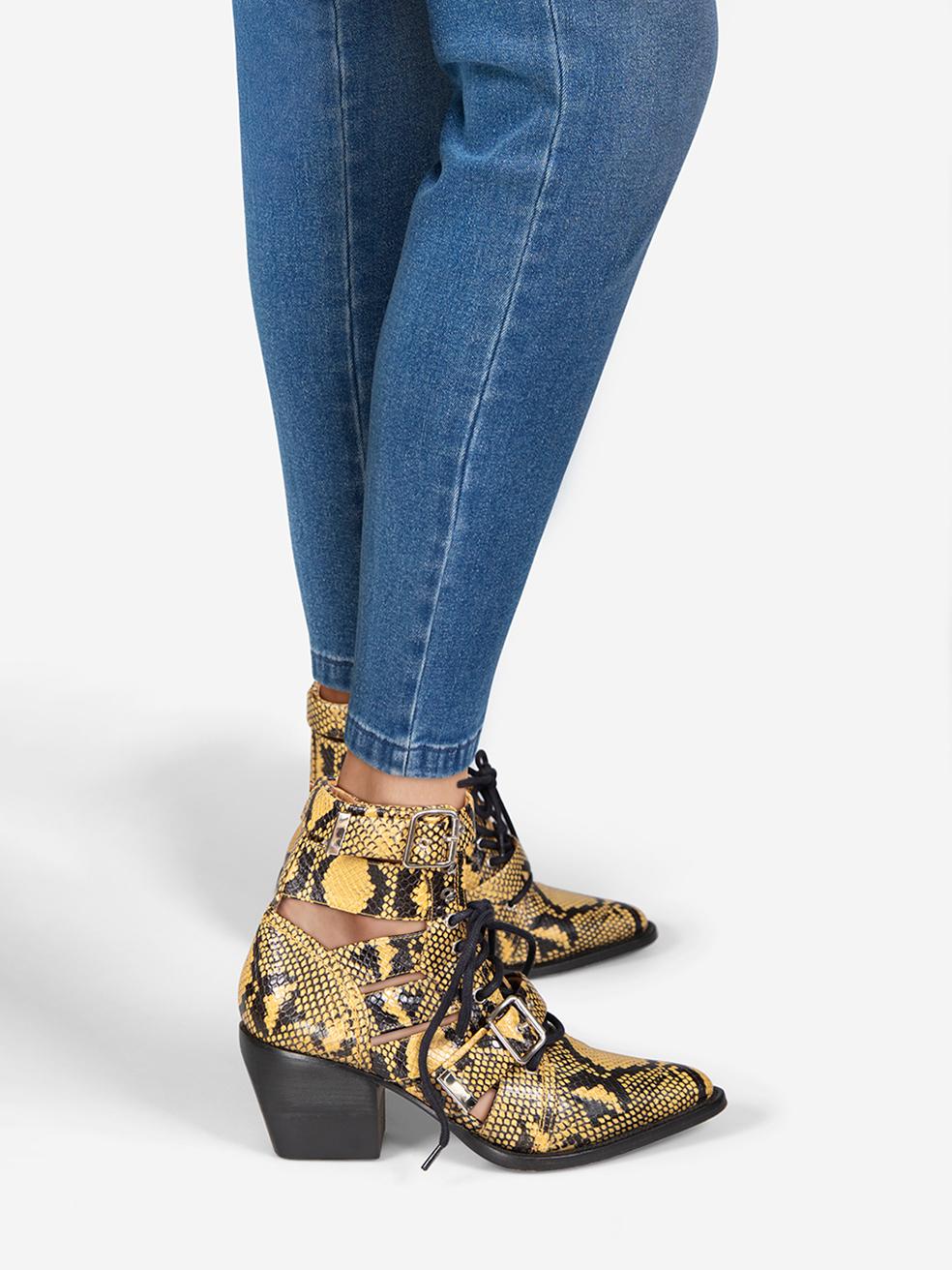 CONDITION is Very good. Minimal wear to the boots is evident. Abrasion to both heels on this used Chloé designer resale item. This pair of shoes comes in the original dust bags.
 
 Details
 
 
 Model: Rylee
 
 Multicolour - Yellow & Black
 
 Boots
