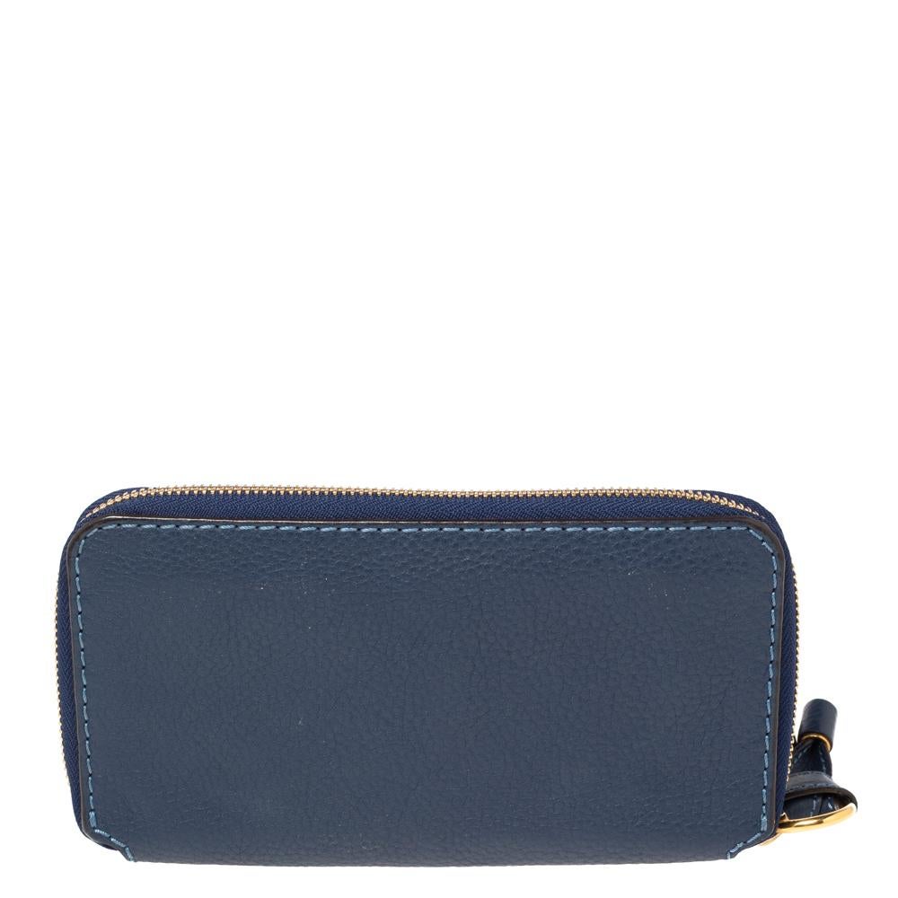 Luxe and classy, this zip-around wallet is from Chloe. It has been crafted from leather, detailed with front gold-tone accents, and equipped with a zipper leading to multiple slots and compartments for you to neatly carry your essentials.