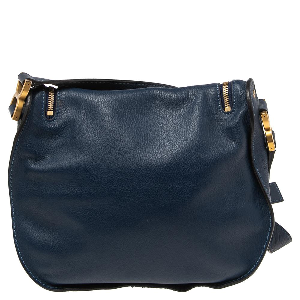 Stunning to look at and durable enough to accompany you wherever you go, this Chloe bag is a joy to own! This Marcie bag is crafted from leather with a well-designed front flap and a shoulder strap. The insides are fabric lined and perfectly sized