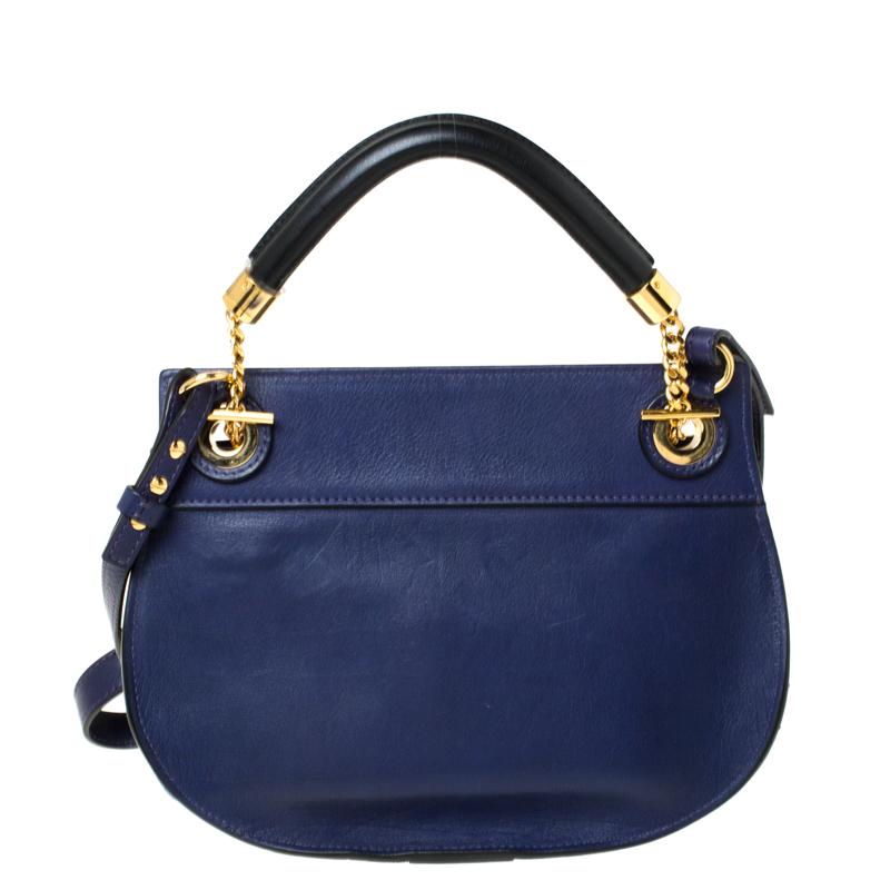 Get your hands on this eye-catching leather bag to essential your work-week look. This bag has a fabric-lined interior ideal for your essentials. Make a stunning appearance every time you carry this classic handbag by Chloe. Brilliantly designed,