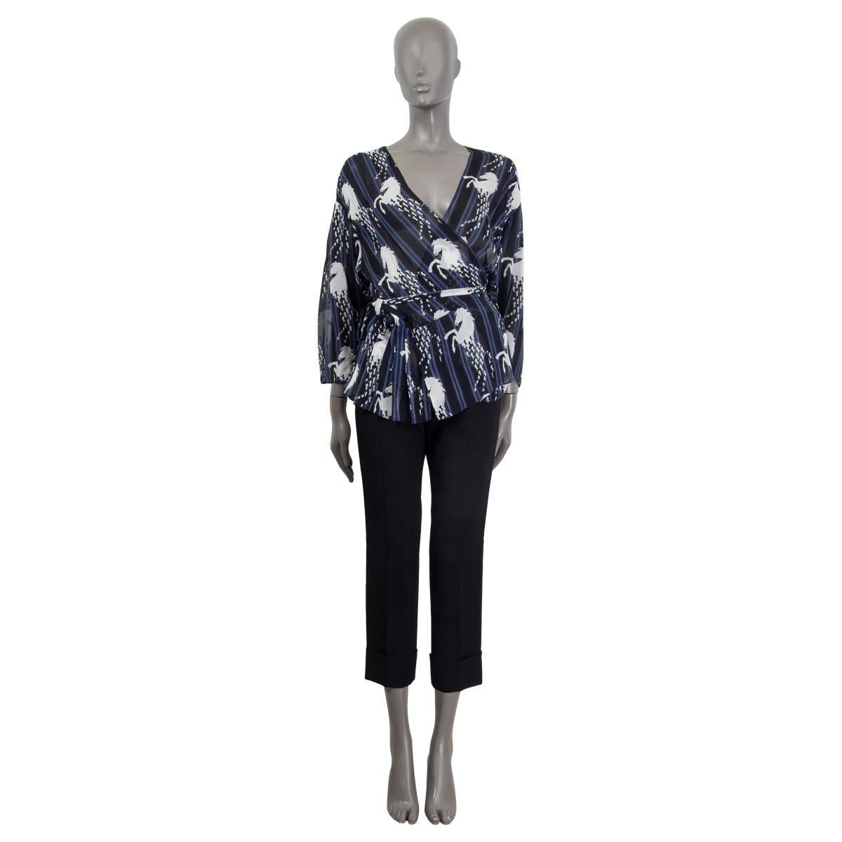 100% authentic Chloé horse print wrap blouse in blue, black and white silk (100%). Opens with a concealed button and a self tie ribbon. Unlined. Has been worn and is in excellent condition.

Measurements
Tag Size	36
Size	XS
Shoulder Width	47cm