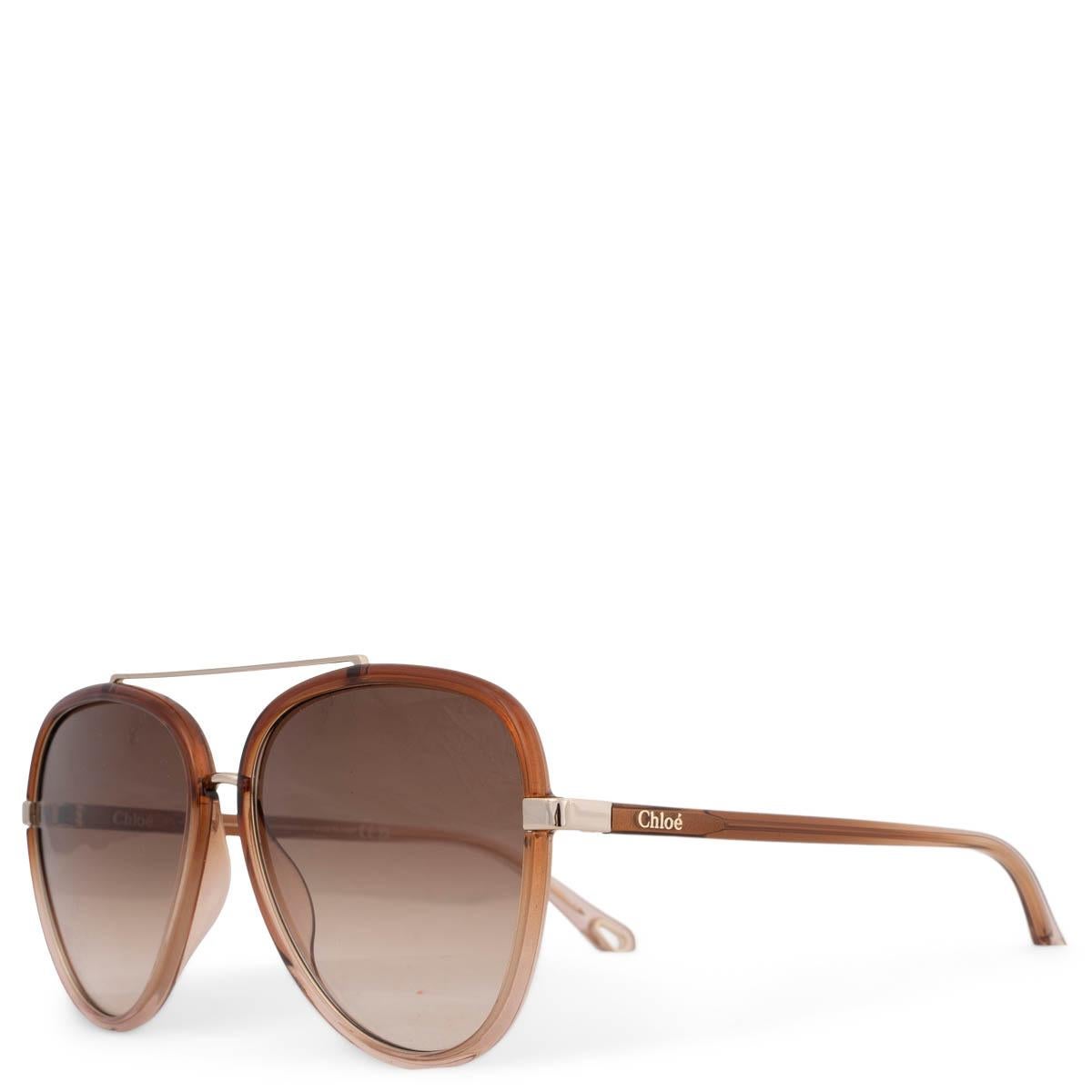 100% authentic Chloé 2022 aviator sunglasses in brown transparent acetate. Feature gold-tone metal details and gradient brown lenses.Have been worn and are in excellent condition. Comes with case.

Measurements
Model	CH0129S 002 58
Width	14cm