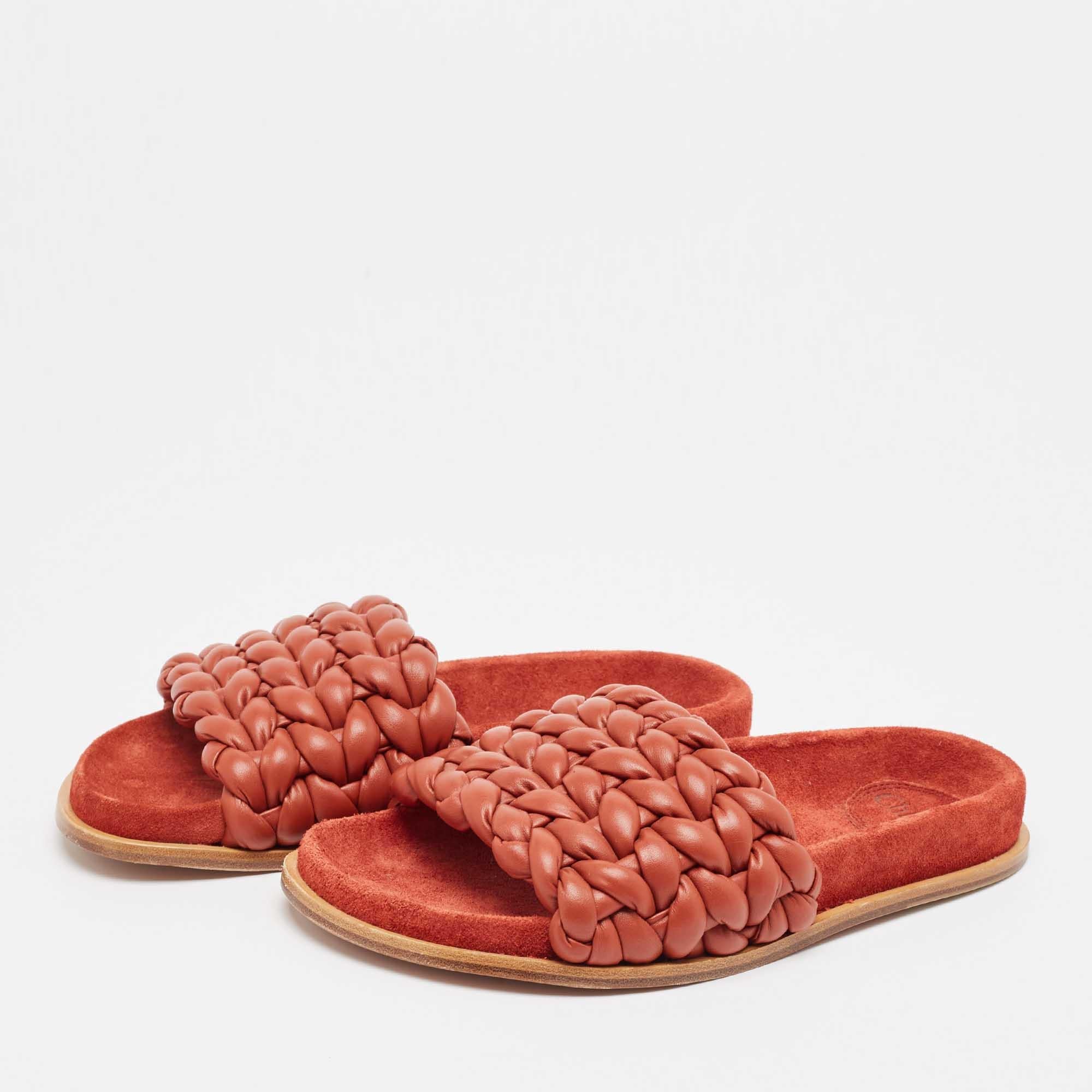 Enhance your casual looks with a touch of high style with these designer slides. Rendered in quality material with a lovely hue adorning its expanse this pair is a must have