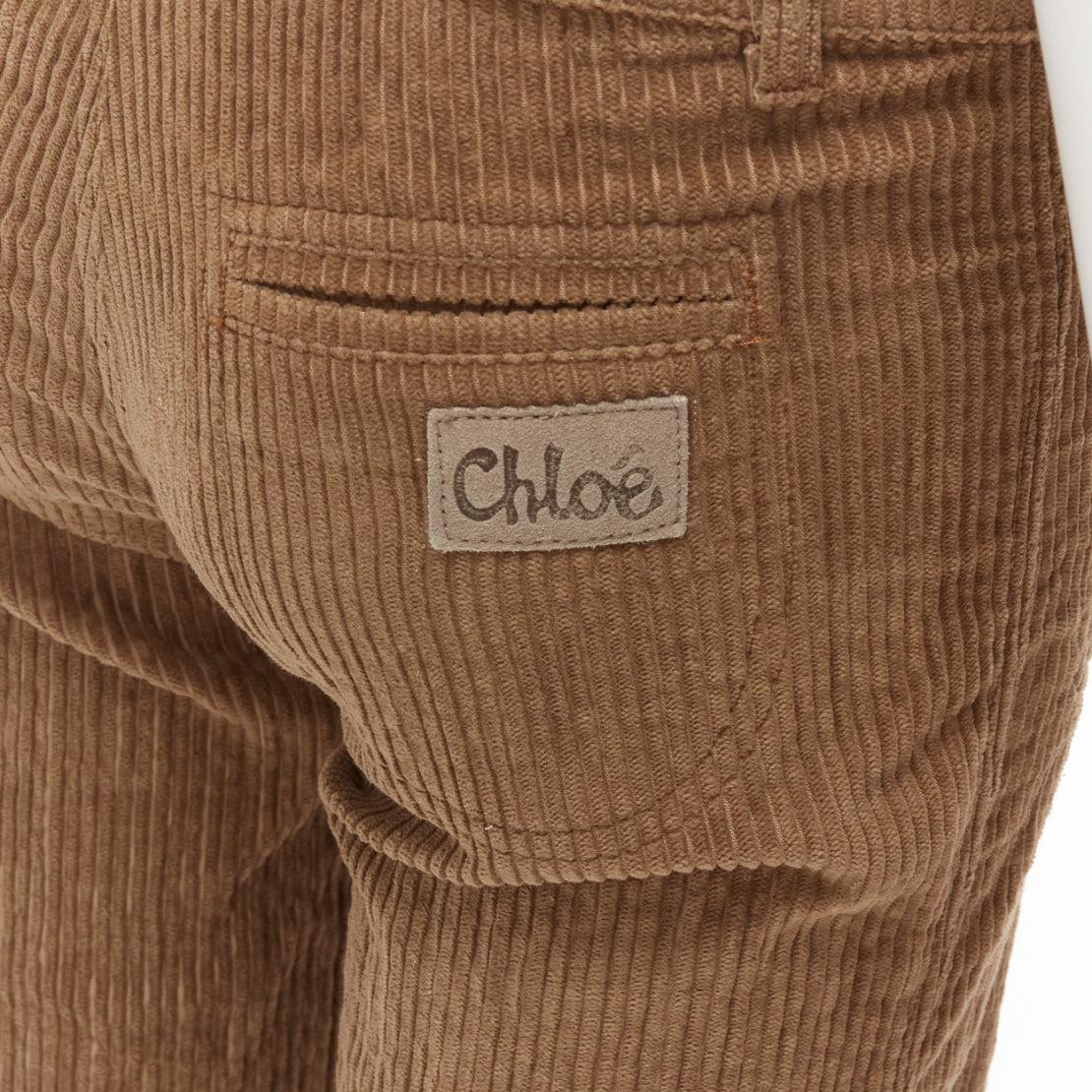 CHLOE brown cotton corduroy low waist flared pants FR34 XS
Reference: NKLL/A00207
Brand: Chloe
Material: Cotton, Blend
Color: Brown
Pattern: Solid
Closure: Zip Fly
Extra Details: Chloe logo tab at back right pocket.
Made in: