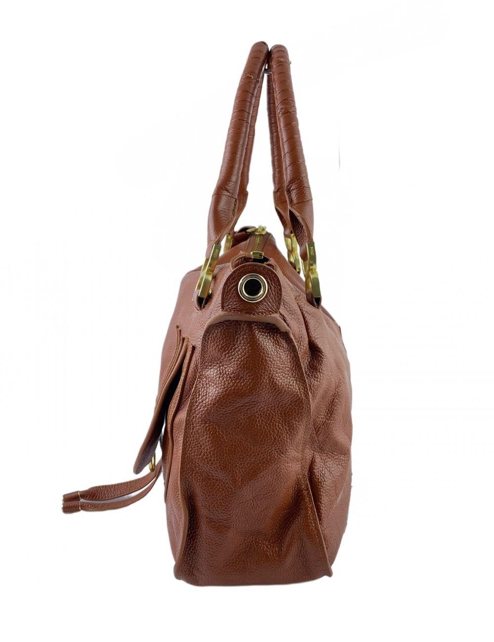 Chloé Brown Marcie leather large satchel bag. Fabric interior lining with side zipper pocket. Tassel deatils embossed with Chloe logo.

Material: Leather
Height: 28cm
Width: 39cm
Depth: 12cm
Handel Drop: 24cm 

Condition: 
Overall condition: Very