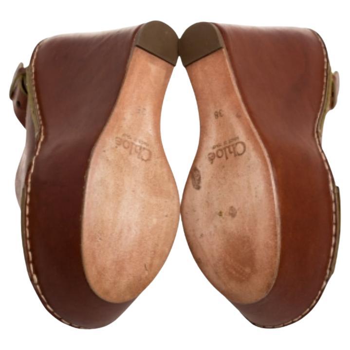 Wear them through the day or dress them up for day time parties, these Chloe sandals are stylish and comfortable. With brown leather criss-cross straps on the vamps and slingbacks on the ankles, these shoes feature high platforms and wedges that
