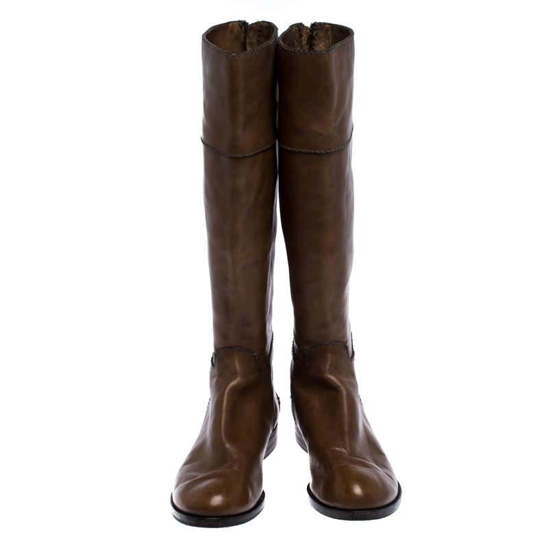 These leather boots will lend a twist to your outfit. Knee-length boots are a fashionista's best friend. Head out in style in this pair of fabulously classy boots from the house of Chloe. This comfortable pair comes in a gorgeous shade of brown.

