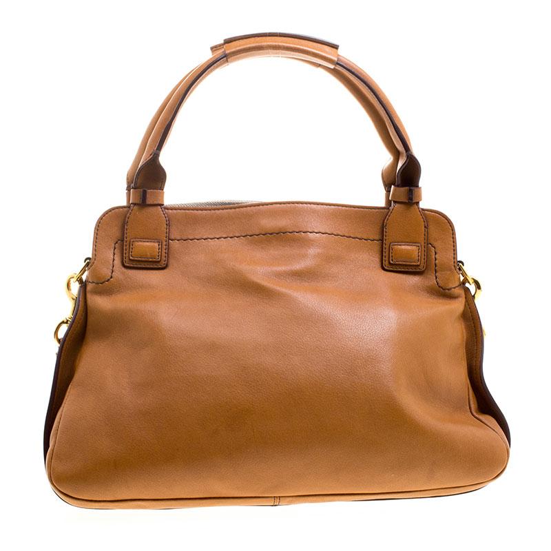 A spacious bag to hold all your essentials with ease, this Chloe Margaret shoulder bag is stylish enough to pair with almost any day time look. Crafted in brown leather, this bag features gold tone hardware details that perfectly compliment and