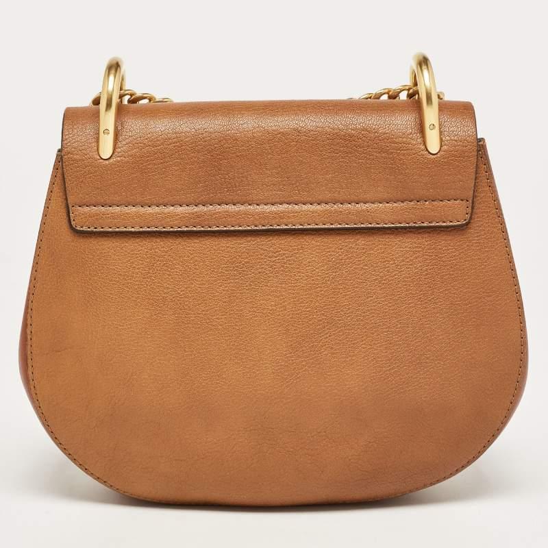 One of the most iconic bags in the luxury world, Chloe's Drew bag was part of the label's fall/winter 2014 collection. It carries a distinct shape with minimal detailing. This bag has been skillfully crafted from leather and designed with a pin lock