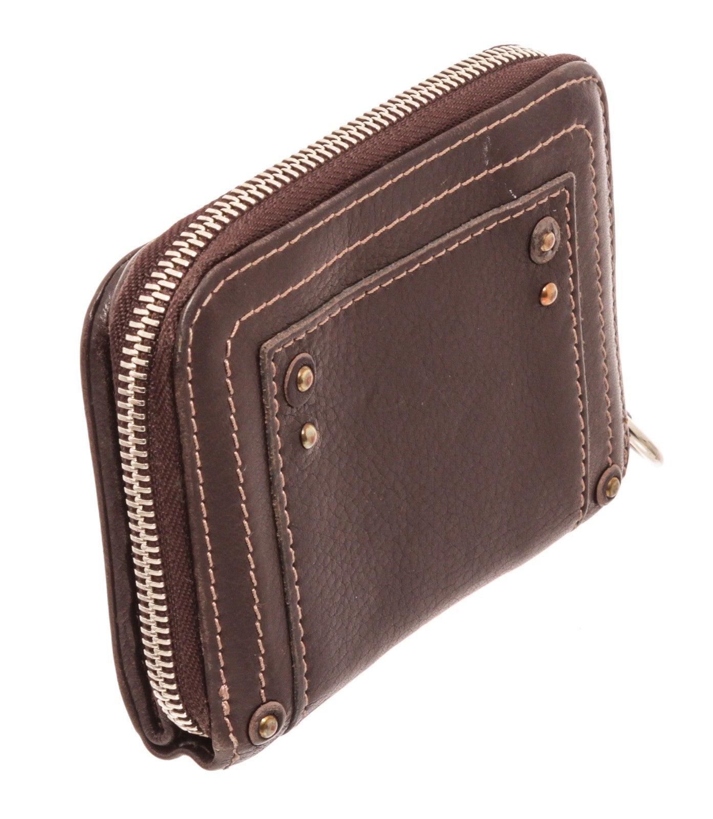 Paddington Brieftasche aus braunem Leder mit goldfarbenem Besteck und Lederbesatz (Schwarz)