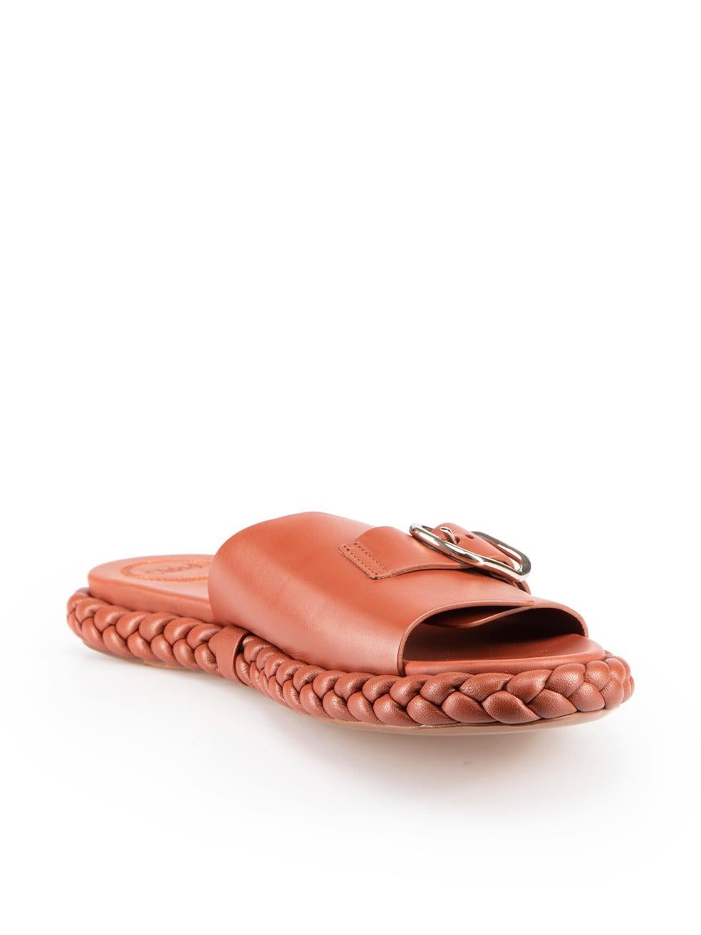 CONDITION is Never worn. No visible wear to shoes is evident on this new Chlo√© designer resale item.
 
Details
Brown
Leather
Slides
Silver buckle detail
Open toe
Braided sole detail
 
Made in Italy
 
Composition
EXTERIOR: Leather
INTERIOR: Leather
