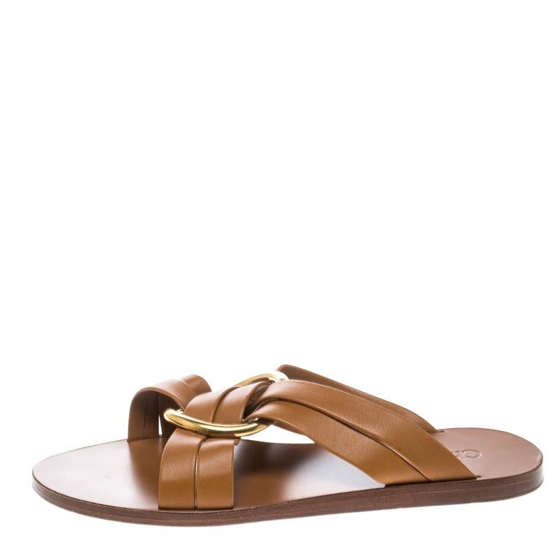 You'll love to walk in these flats from Chloé as they are stylish and modern. They flaunt leather straps laid in a crisscross manner and held by a gold-tone ring. They are perfect for one's casual style.

