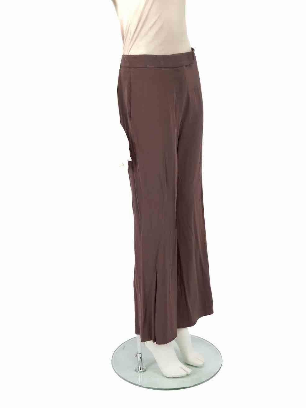 CONDITION is Very good. Minimal wear to trousers is evident with a small mark evident on the front wasitband on this used Chloé designer resale item.
 
 
 
 Details
 
 
 Brown
 
 Synthetic
 
 Trousers
 
 Straight leg
 
 High rise
 
 2x Side pockets
