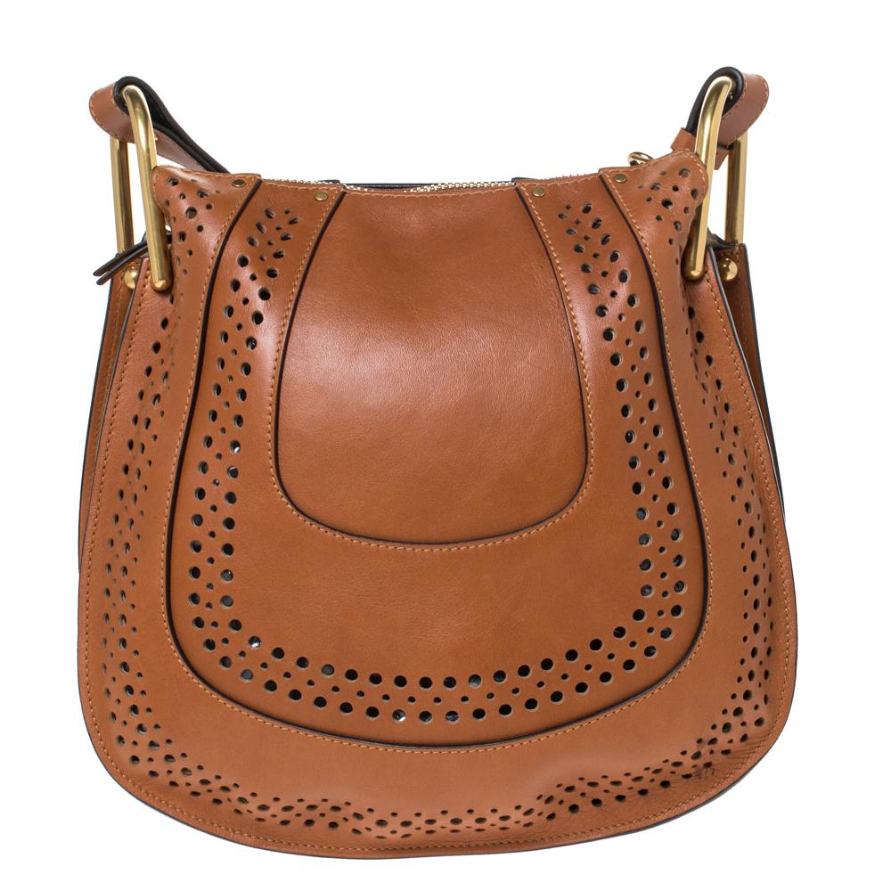This Chloe handbag is a must-have item in your collection. A good pick for everyday use or special events, this pleasing brown piece is true to its existence. Flaunt this fantastic-looking leather bag and give yourself a sophisticated