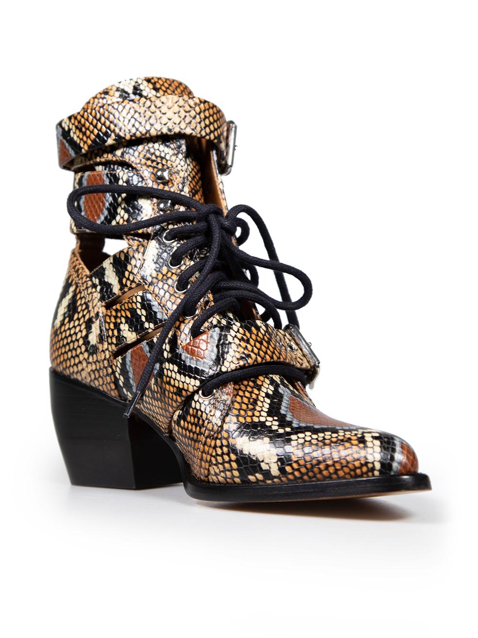 CONDITION is Very good. Hardly any visible wear to boots is evident. However, due to poor storage, there is light tarnishing to the front two buckles on the right shoe on this used Chloé designer resale item. This item comes with an original dust