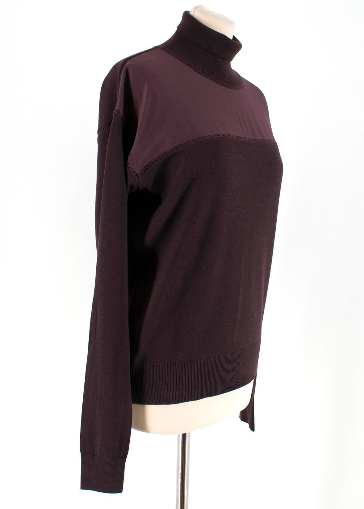 Chloe Burgundy Wool Turtleneck Sweater

- Burgundy wool sweater
- Lightweight
- Turtleneck
- Long sleeved
- Ruched cuffs
- Front silk panel

Please note, these items are pre-owned and may show some signs of storage, even when unworn and unused. This