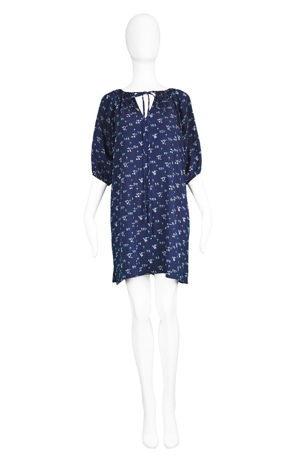 Chloé by Karl Lagerfeld Vintage Dark Blue Crinkled Silk Floral Mini Dress, 1970s

Click 'Continue Reading' below to see size & description. 

Size: Marked FR 38 which is a UK 10/ US 6 but this gives a loose, flowing silhouette and would also suit