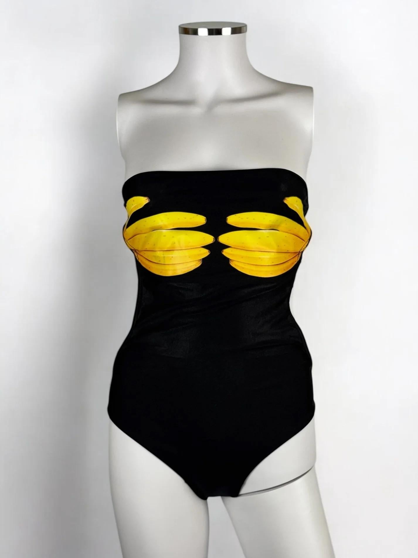 Chloé by Stella McCartney iconic black banana graphic swimsuit, Spring Summer 2001
Exceptionally rare with “keep your bananas off my melons” slogan at the back
Bandeau style, the idea being that the bananas cover the breasts, but on a plastic