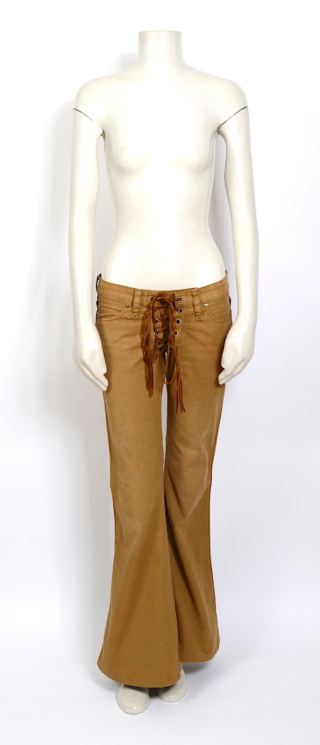 Incredible trousers by Chloe.
Vintage late 90's low waist cotton with a suede front lace-up detail closure pants 
Made in France - Size 38
Measurements are taken flat:
Inside seam 33inch/79cm - Outside seam 39inch/99cm - Rize front 8inch/20cm - Rize