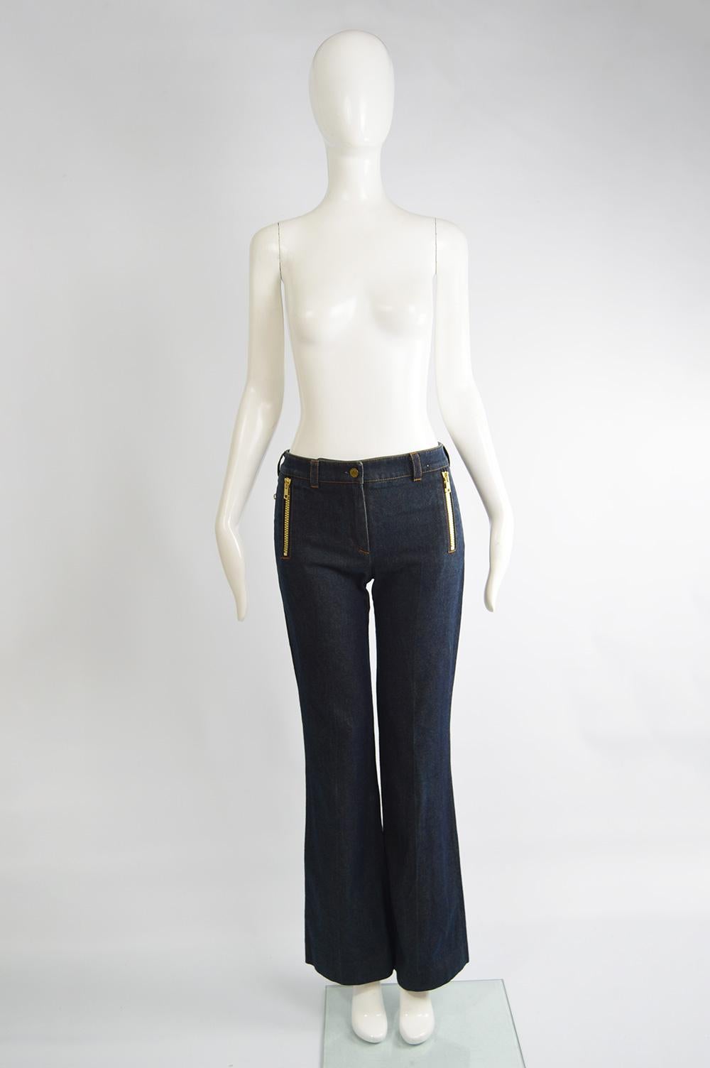 A fabulous and rare pair of Chloe jeans from the S/S 2001 collection, designed by Stella McCartney as seen on the runway. In a dark blue denim with a slightly low rise, chunky zip detailing and the iconic horse design in sequins on the back
