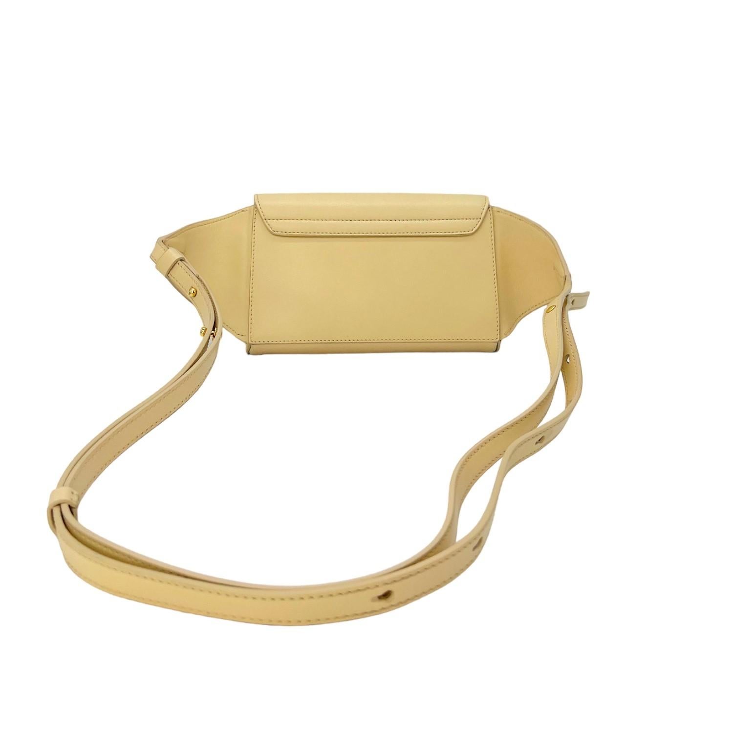 This Chloé Belt Bag was made in Italy and it is finely crafted of a calfskin leather and suede exterior with gold-tone hardware features. It has a fold over snap closure that opens up to a canvas interior with a slip pocket. It features an