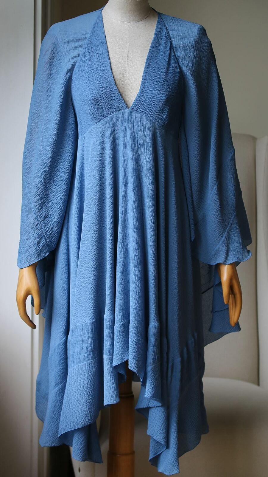 No Chloé Collection Is Complete Without A Bohemian Dress Or Two And We Love This Season's Style. Cut From Cornflower-Blue Silk-Crepon, It Has A Cape-Like Layer At The Back And A Swishy Handkerchief Hem To Create Lots Of Movement. Cornflower-Blue