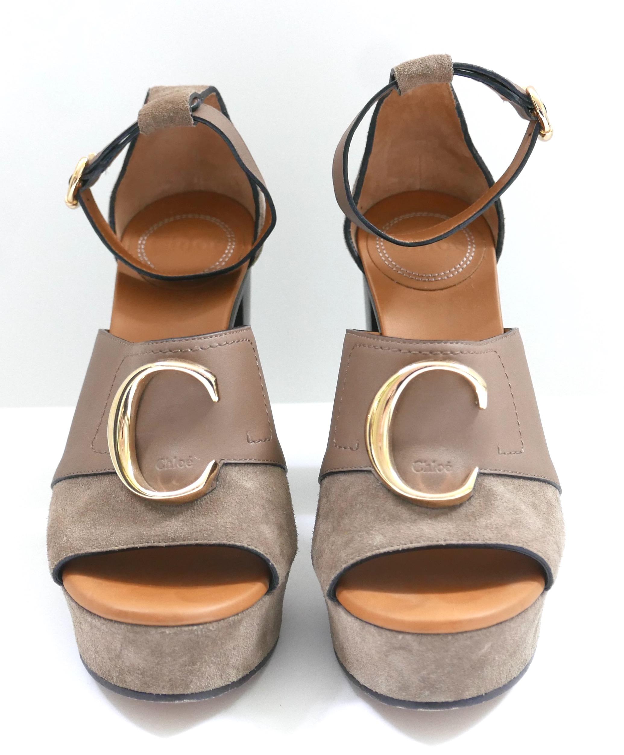 Iconic Chloe C logo platform sandals. Worn 3 times and show some light surface wear. Come with dustbag. Made from thick taupe coloured suede and leather, they have brass C badges and buckles, chunky stacked high heels, padded footbeds and platform