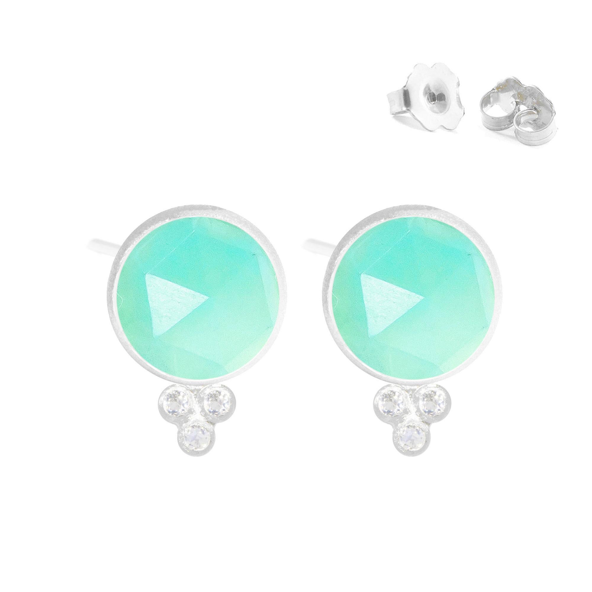A Nina Nguyen classic: Our Chloe Silver Studs are designed with faceted chrysoprases rimmed in silver, and accented with gemstones for some extra sparkle.
Nina Nguyen Design's patent-pending earrings have an element on the back of the stud or charm