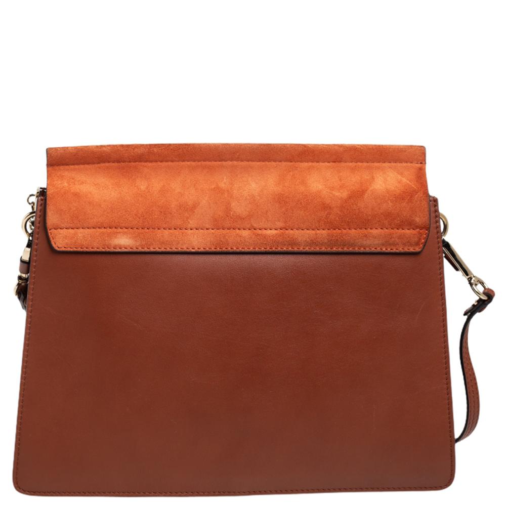 You are going to love owning this Faye shoulder bag from Chloé as it is well-made and brimming with luxury. The bag has been crafted from leather and suede and designed with a flap with chain detail and well-sized suede compartments for your