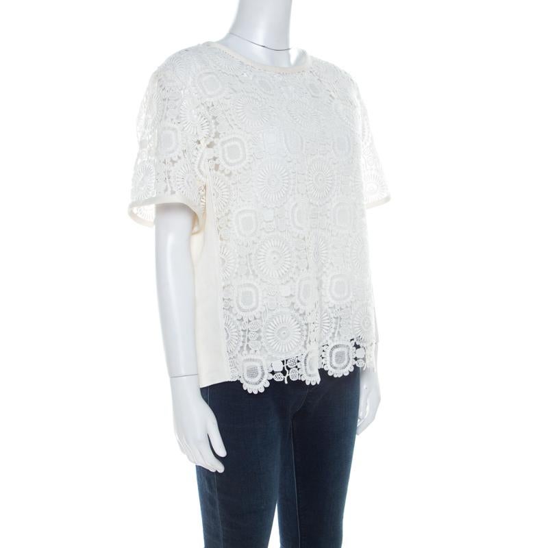 This Chloe top combines the brand's elegant aesthetics with the latest trends of the season. Revamp your closet when you add this cream creation to it. This top is crafted with a blend of cotton and linen and can be paired with high-waisted bottoms