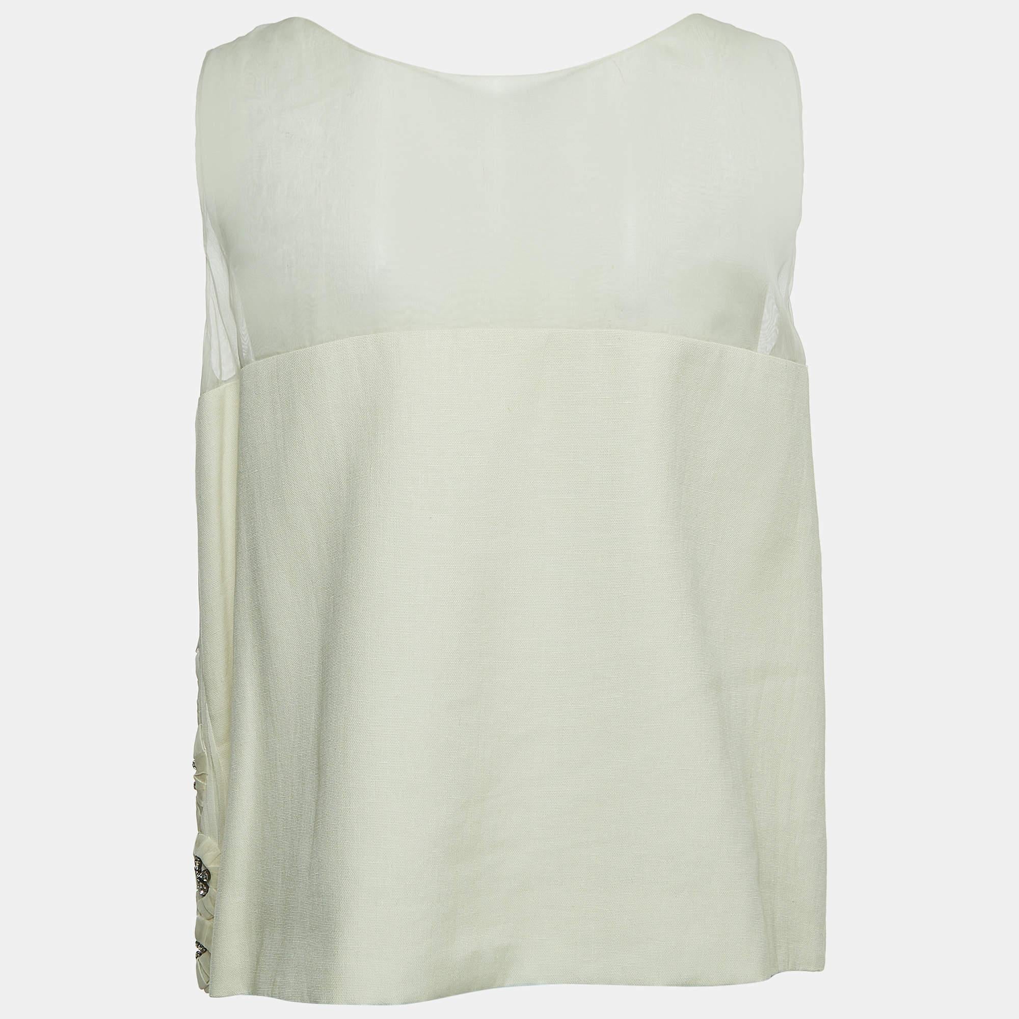 Find great style and comfort while wearing this designer top. Tailored using the best fabric the creation has been given immense detail. Style it with a skirt and heels.