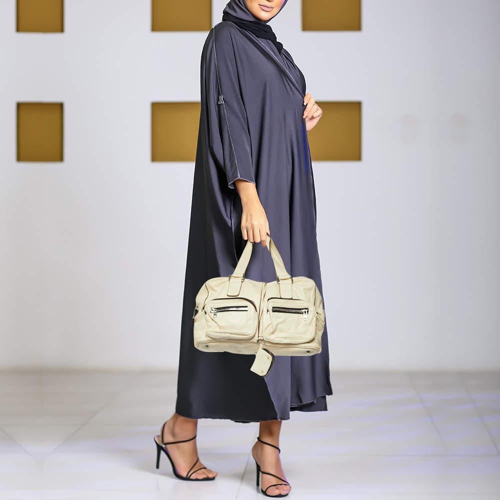 This satchel is rendered in the finest quality materials into an elegant design. Versatile and functional it is well sized for your daily use.